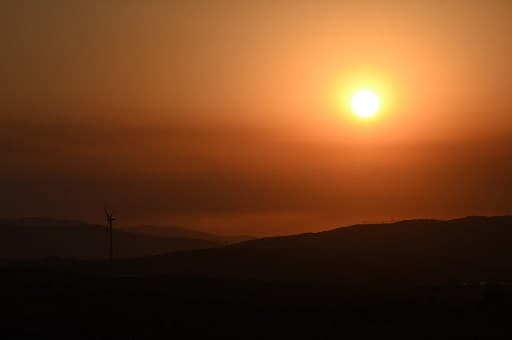Wildfires rage across million acres as heat wave stifles western US ...